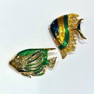 Pair of vintage gold-toned and enamel fish brooches.